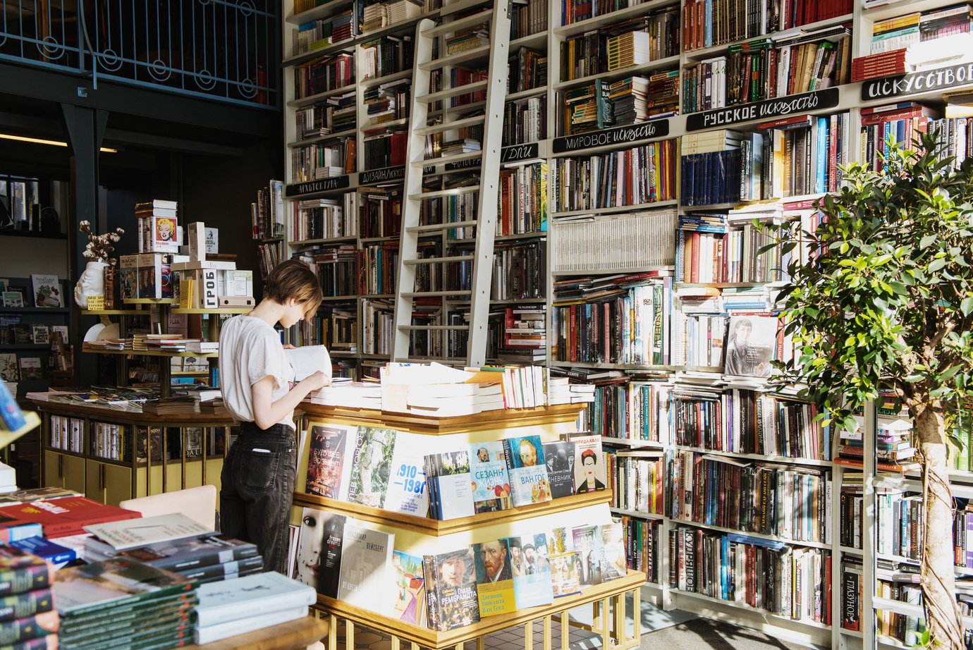 Person Inside A Bookstore